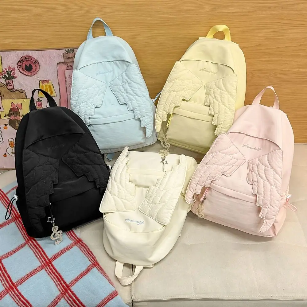 Canvas Backpack Casual - กระเป๋าเป้สะพายหลังลายปีกนางฟ้าอเนกประสงค์ สไตล์ Y2K กระเป๋าเป้ผ้าแคนวาสความจุขนาดใหญ่ น้ำหนักเบา ลายปัก