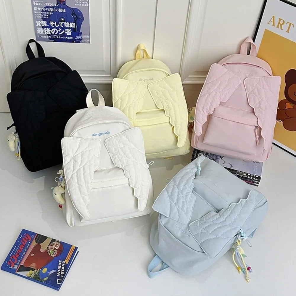 กระเป๋าเป้สะพายหลังลายปีกนางฟ้ - Canvas Backpack Casual บทวิจารณ์และราคา
