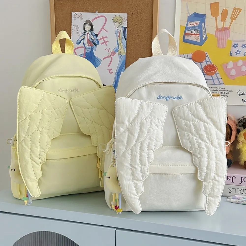 กระเป๋าเป้สะพายหลังลายปีกนางฟ้ - Canvas Backpack Casual บทวิจารณ์และราคา